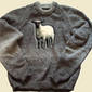Sheep on a wool sweater
