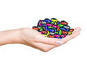 A hand full of Smarties